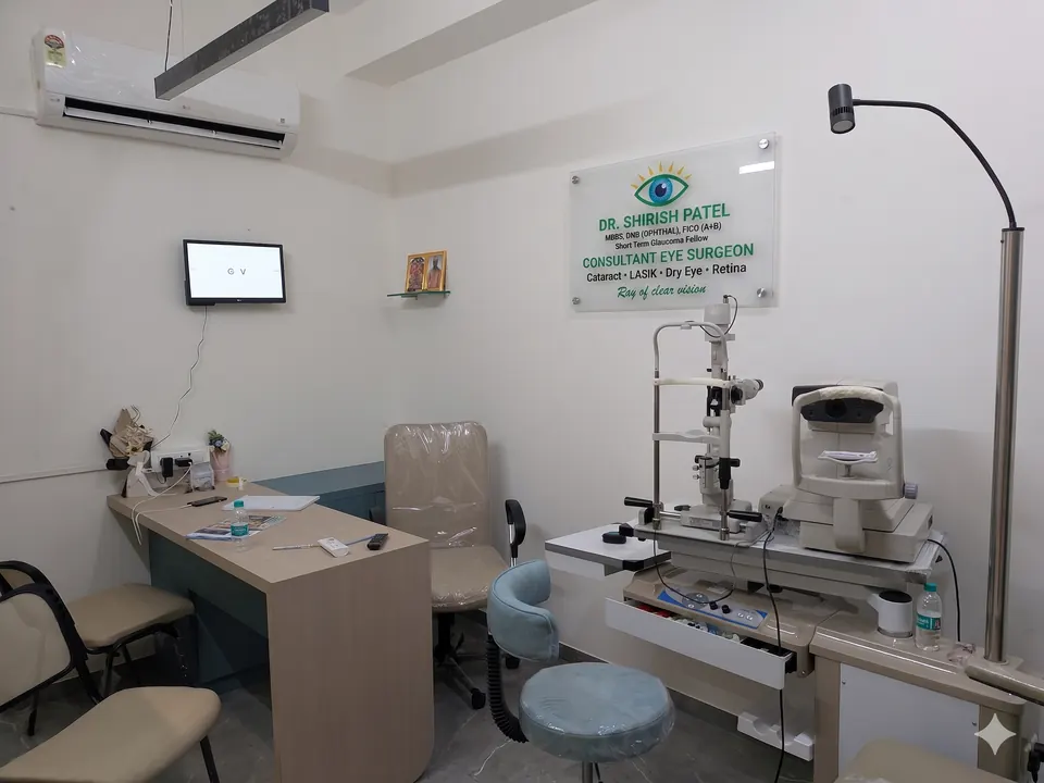 Examination room at Advanced Eyecare Centre with slit-lamp, auto-refractor and diagnostic equipment